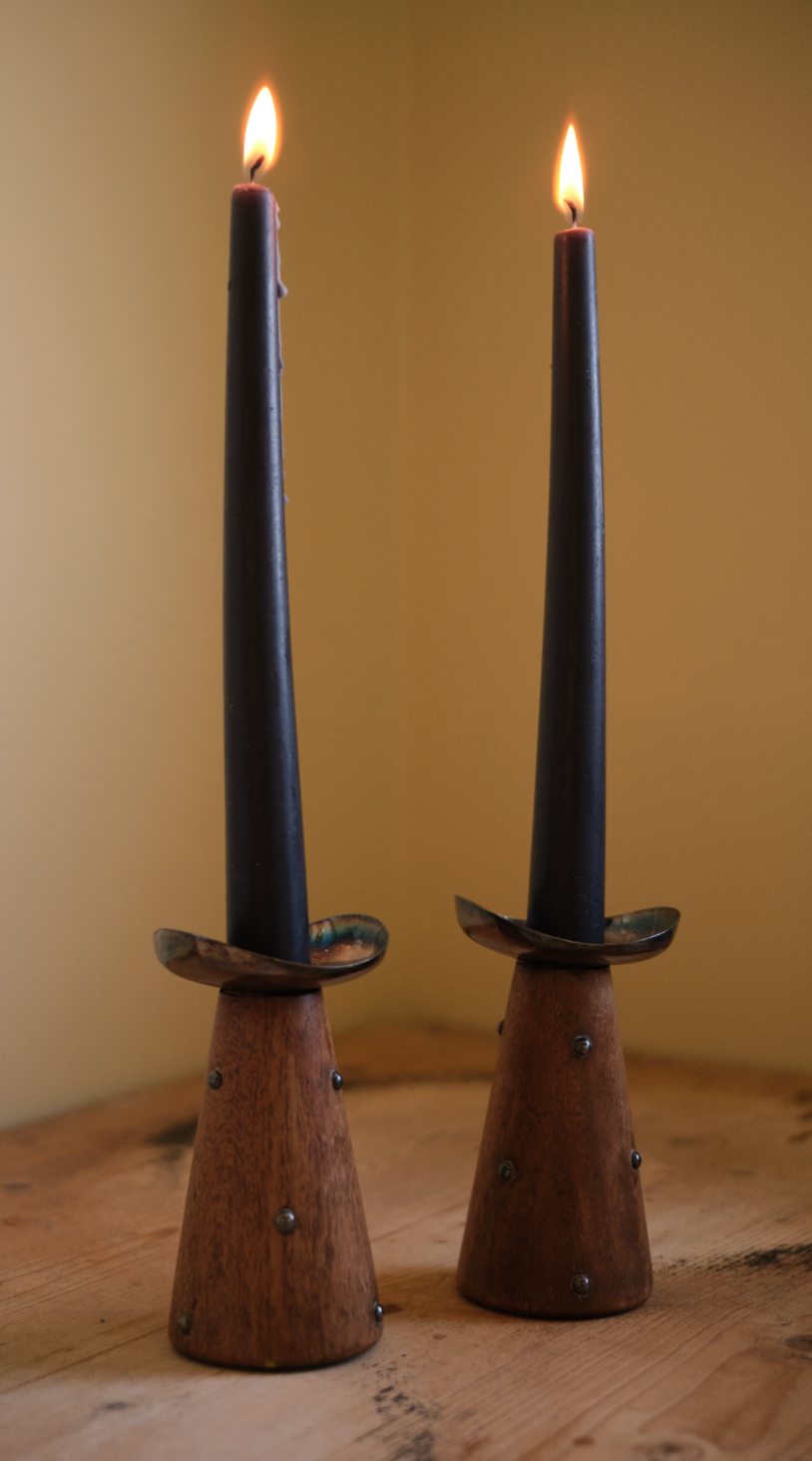 X HANS JENSEN. Pair of teak and silver-plated candlesticks