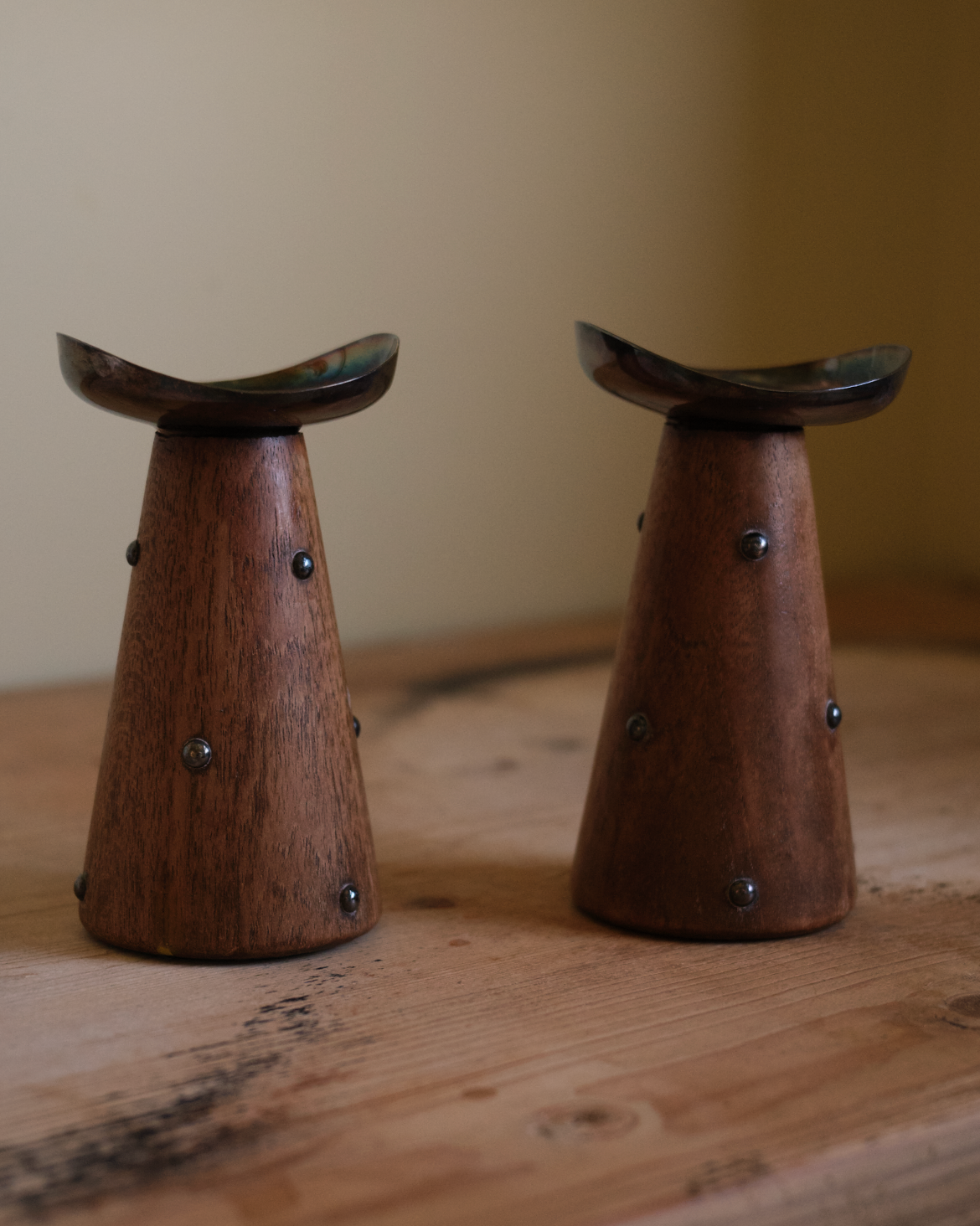 X HANS JENSEN. Pair of teak and silver-plated candlesticks