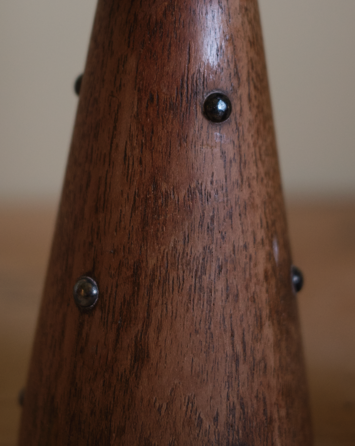 X HANS JENSEN. Pair of teak and silver-plated candlesticks