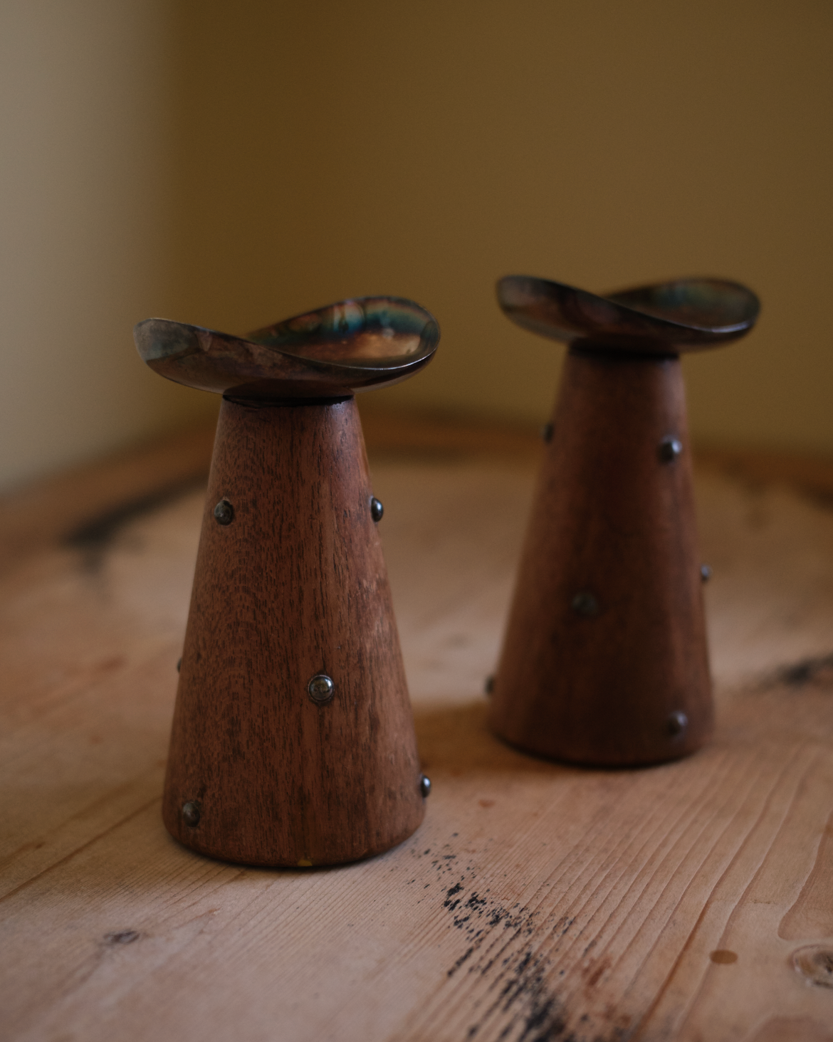 X HANS JENSEN. Pair of teak and silver-plated candlesticks