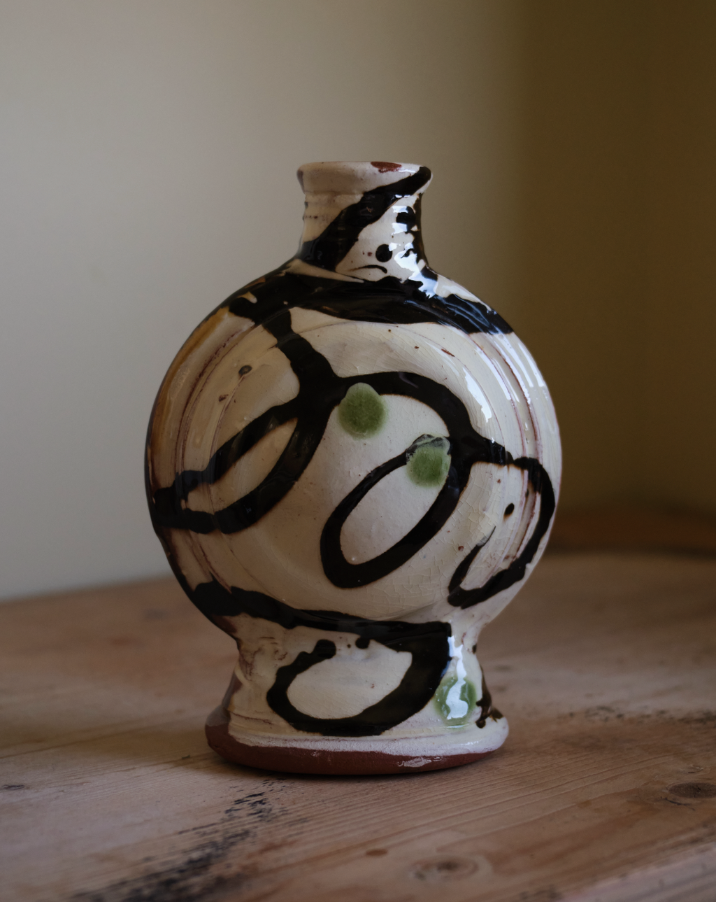 X DYLAN BOWEN slip decorated earthenware bottle