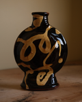 X DYLAN BOWEN slip decorated earthenware bottle